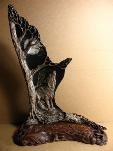Howling wolf, relief carving, moose antler, wood